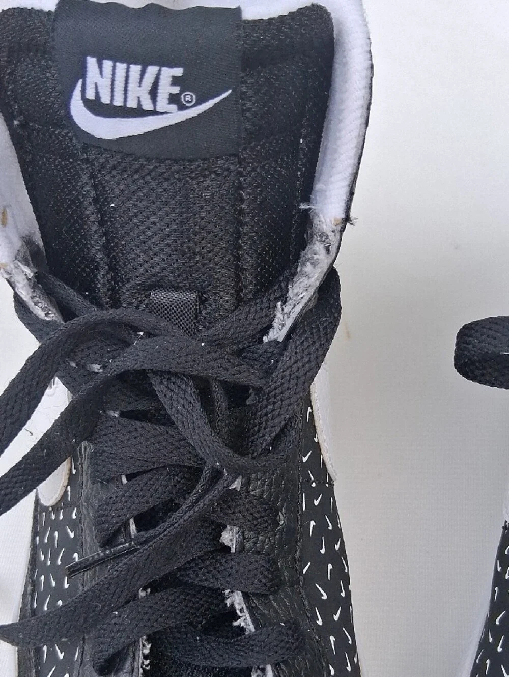 Nike Black and White High-Top Sneakers